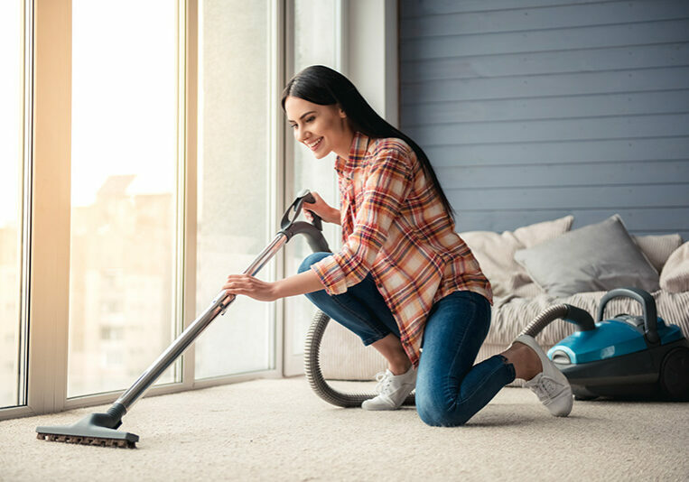 Beautiful woman cleaning house | Jimmie Lyles Flooring Gallery